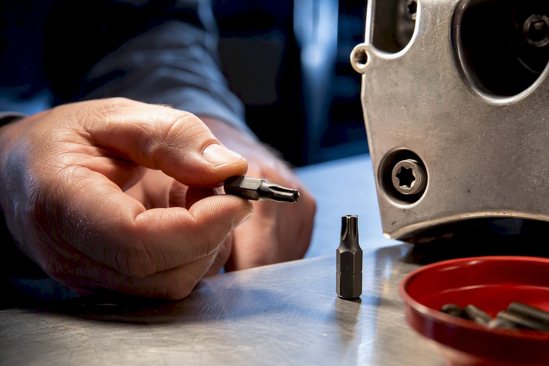 Close-up of Torx bit and fastener recess