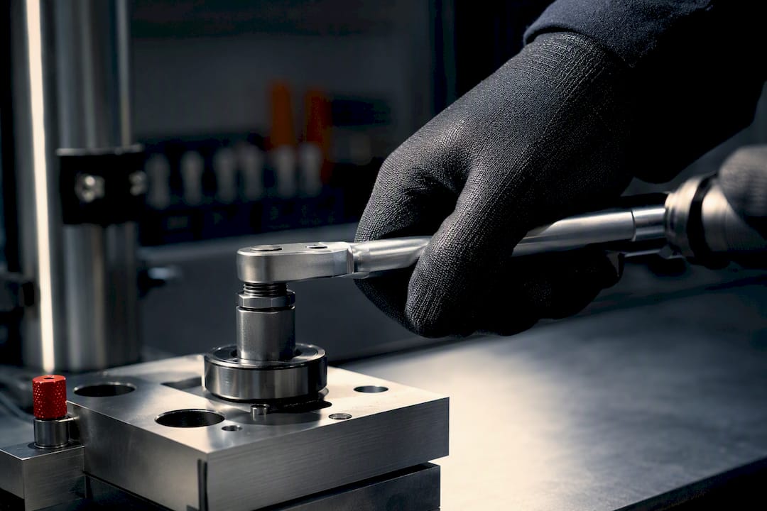 Mechanic applying torque to a fastener